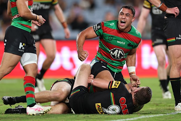 SYDNEY, AUSTRALIA - MARCH 27: Davvy Moale of the Rabbitohs celebrates with team mates after scoring a try during the round four NRL match between the South Sydney Rabbitohs and Penrith Panthers at Accor Stadium on March 27, 2025, in Sydney, Australia. (Photo by Cameron Spencer/Getty Images)