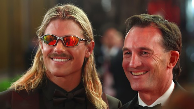 Bailey Smith of the Cats and Andrew Dillon, Chief Executive Officer of the AFL during the 2025 Brownlow Medal ceremony