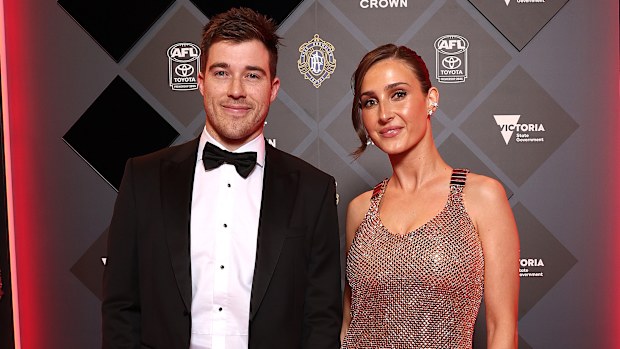 Zach Merrett of the Bombers with wife Alexandra Merrett at the 2025 Brownlow Medal.