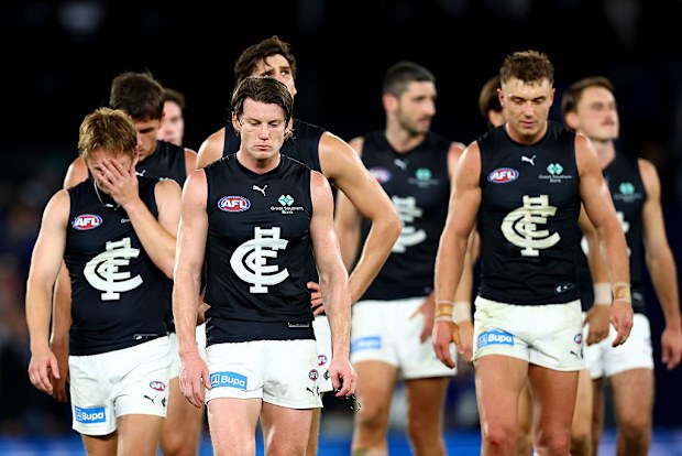 The Blues react after losing to North Melbourne.