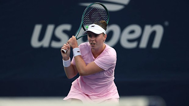 Talia Gibson of Australia returns a shot against Magdalena Frech of Poland.