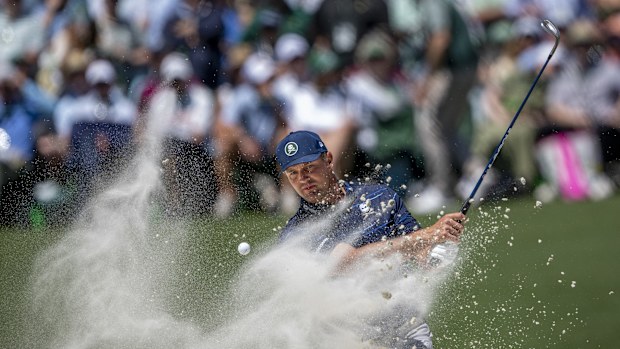 Bryson DeChambeau of the United States plays a stroke from a bunker on the No. 11 hole during the first round of the Masters at Augusta National Golf Club, Thursday, April 09, 2026. (Photo by Kohjiro Kinno/Augusta National/Getty Images)