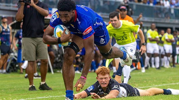 Etonia Waqa of the Fijian Drua scores a try during the round five Super Rugby match.