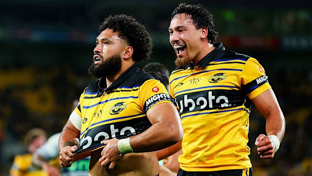 Fehi Fineanganofo of the Hurricanes celebrates after scoring a try.