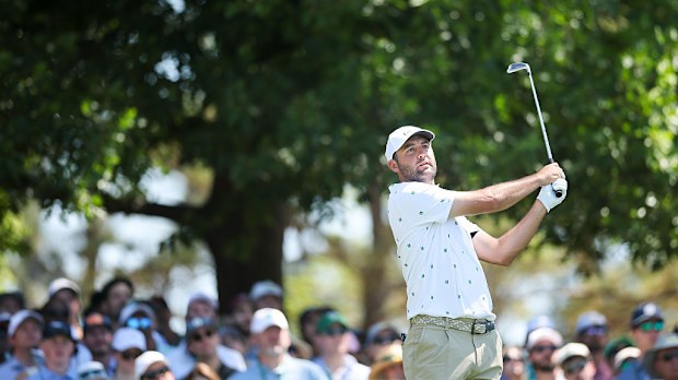 Scottie Scheffler plays a shot on the fourth hole during the third round.