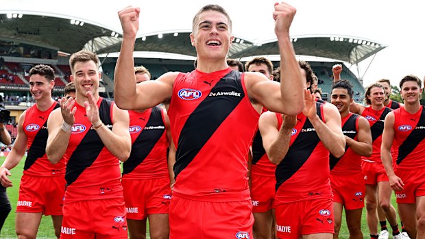 Sullivan Robey of the Bombers celebrates winning the round five AFL match.