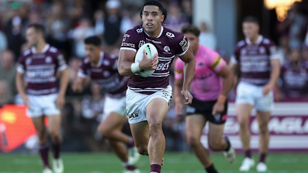 Tolu Koula races away to score against the Panthers.