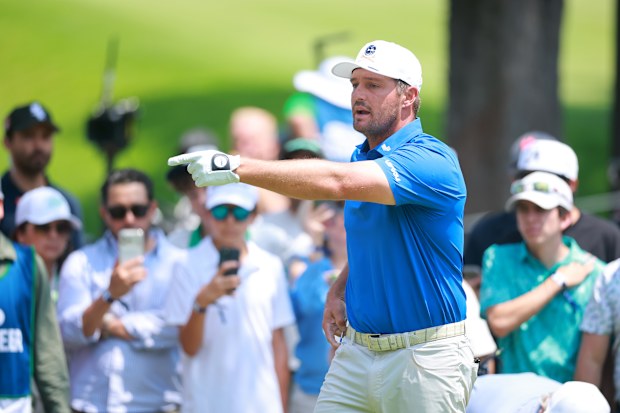 Bryson DeChambeau of Crushers GC reacts from the second green during day one of LIV Golf Mexico.
