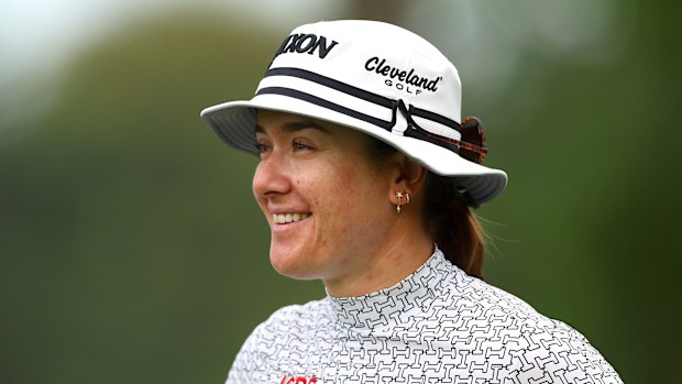 Hannah Green of Australia smiling while leaving the 11th tee during the HSBC Women’s World Championship 2025.