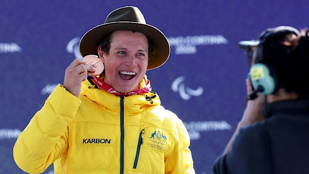 Bronze medallist Ben Tudhope of Team Australia celebrates on the podium.