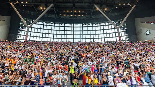 Fans cheer at the South Stand during day three of the Hong Kong Sevens at Kai Tak Stadium.
