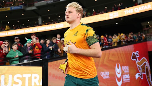 Tom Lynagh of the Wallabies runs onto the field to warm up.