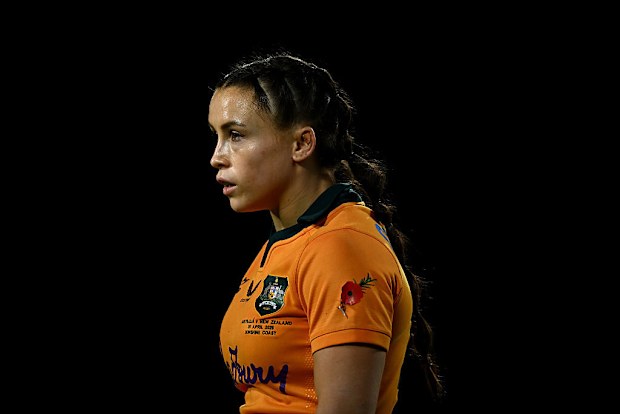 Desiree Miller of the Wallaroos looks on.