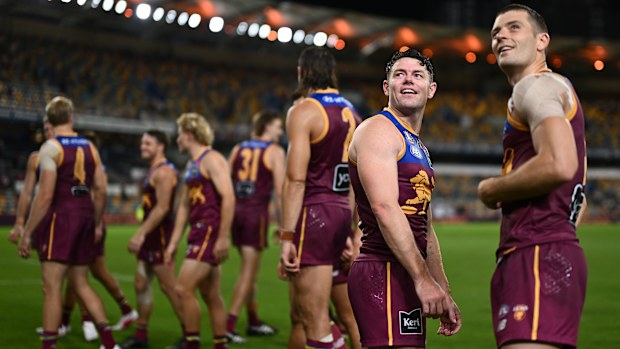 Lachie Neale and Josh Dunkley smile after their victory.