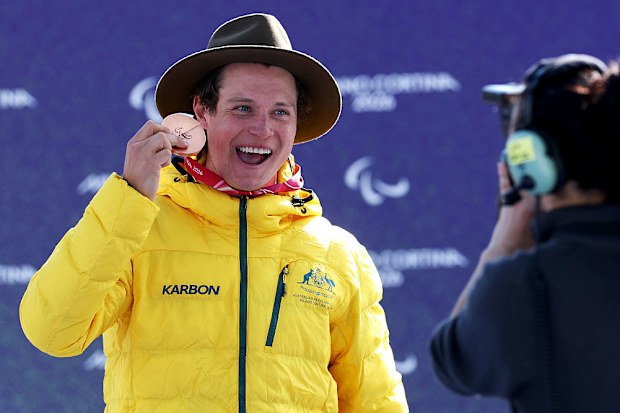 Bronze medallist Ben Tudhope of Team Australia celebrates on the podium.