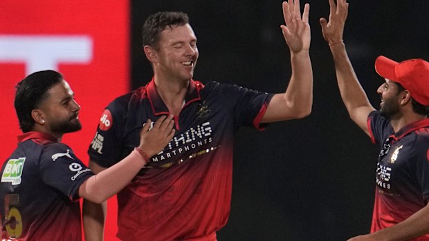 Josh Hazlewood celebrates taking the wicket of Delhi Capitals' Sameer Rizvi.