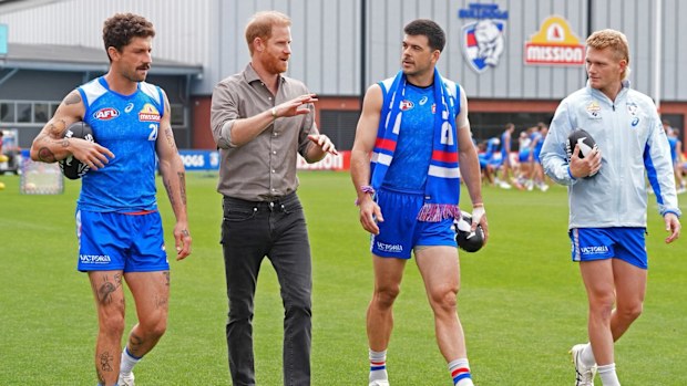 Tom Liberatore, Prince Harry, Matt Kennedy and Adam Treloar at Whitten Oval on Wednesday.