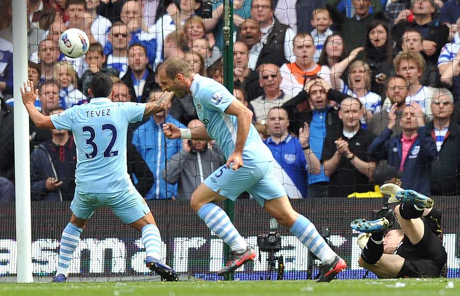 Zabaleta celebrates scoring in Man City's title-winning match with QPR