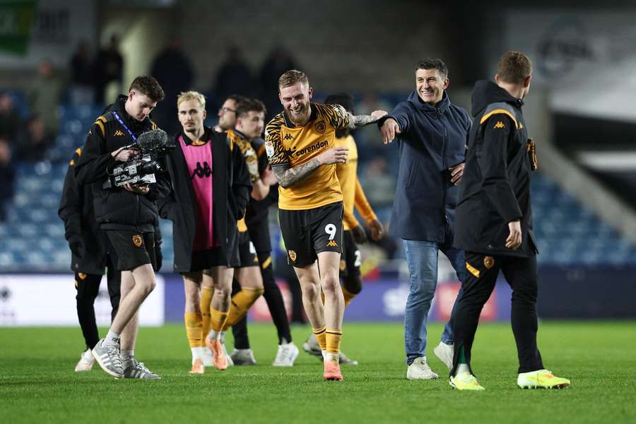 Hull's Oliver McBurnie with Sergej Jakirovic