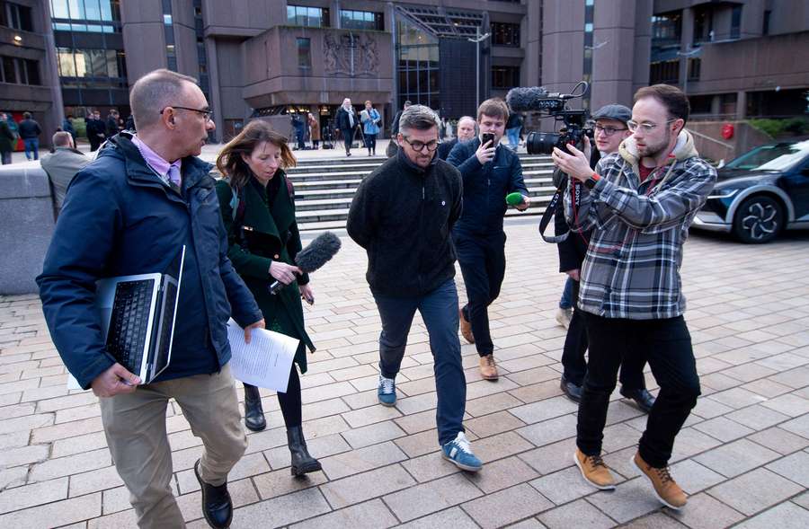 Joey Barton exiting Liverpool Crown Court after sentencing related to online harassment in December 2025
