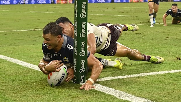 TOWNSVILLE, AUSTRALIA - APRIL 16: Braidon Burns of the Cowboys is tackled by Tolutau Koula of the Sea Eagles during the round seven NRL match between North Queensland Cowboys and Manly Sea Eagles at Qld Country Bank Stadium, on April 16, 2026, in Townsville, Australia. (Photo by Ian Hitchcock/Getty Images)