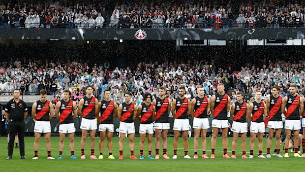 The Bombers line up as part of the the Anzac Observance in 2025.