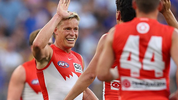 Isaac Heeney celebrates a goal.