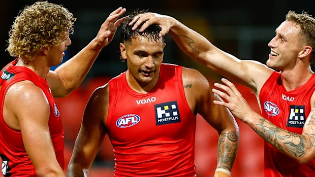 Jamarra Ugle-Hagan of the Suns celebrates a goal during pre-season.