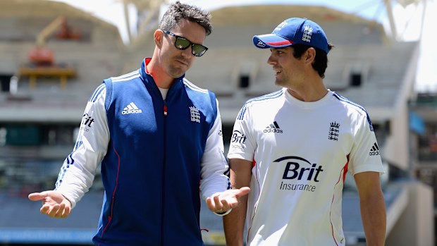 Kevin Pietersen speaks with England captain Alastair Cook during an England Nets Session at Adelaide Oval on December 4, 2013 in Adelaide, Australia. (Photo by Gareth Copley/Getty Images)