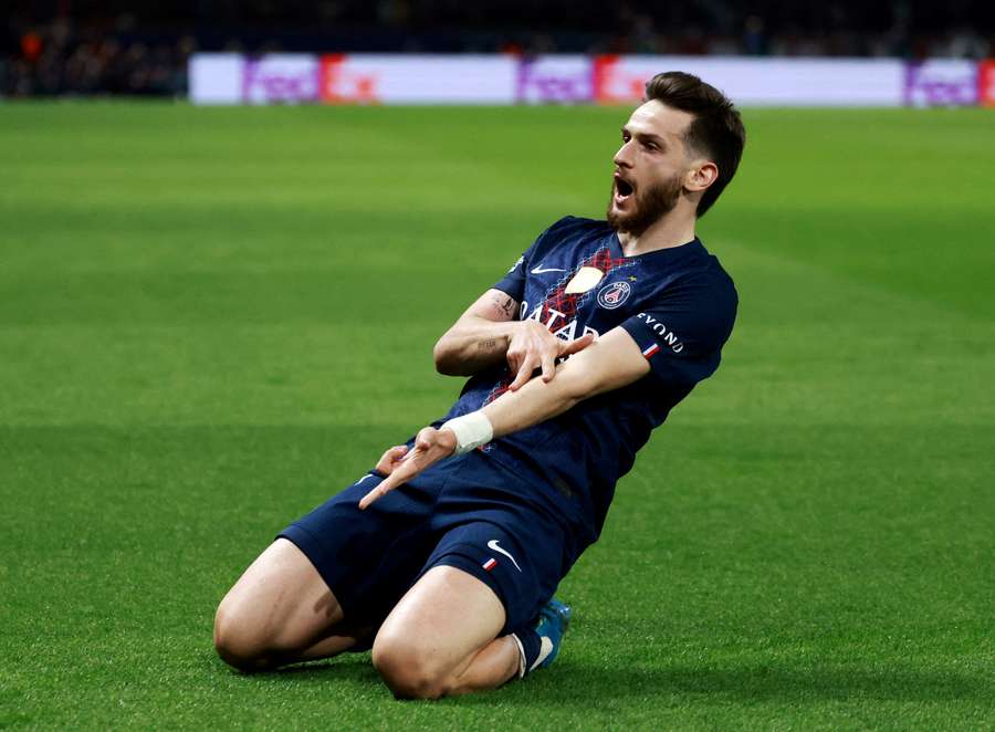 Khvicha Kvaratskhelia celebrating his goal vs Liverpool