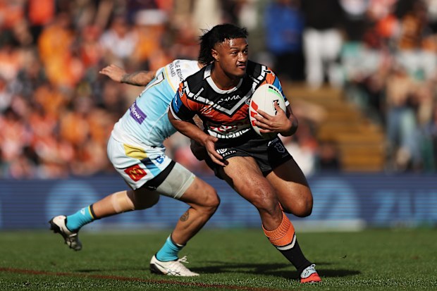 SYDNEY, AUSTRALIA - JULY 20: Latu Fainu of the Tigers runs with the ball during the round 20 NRL match between Wests Tigers and Gold Coast Titans at Leichhardt Oval, on July 20, 2025, in Sydney, Australia. (Photo by Matt King/Getty Images)