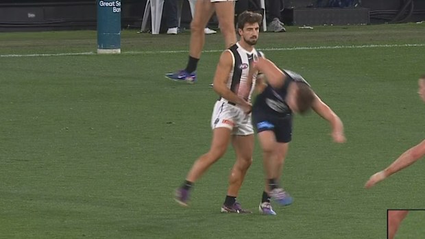 Josh Daicos bumps Talor Byrne to the ground, giving away the free kick.