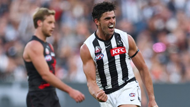 Scott Pendlebury of the Magpies celebrates kicking a goal.