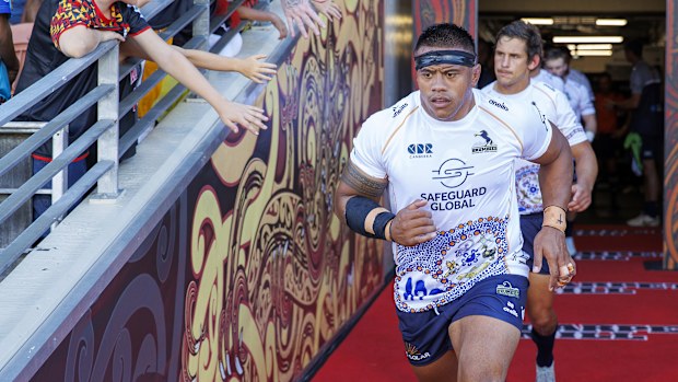 Allan Alaalatoa of the Brumbies leads the team out.