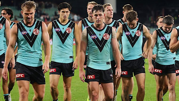 Zak Butters leading the team off after a loss.