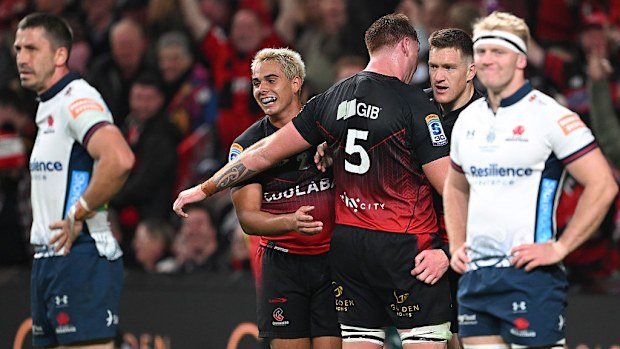 Dallas McLeod of the Crusaders celebrates his try during the round 11 Super Rugby match.